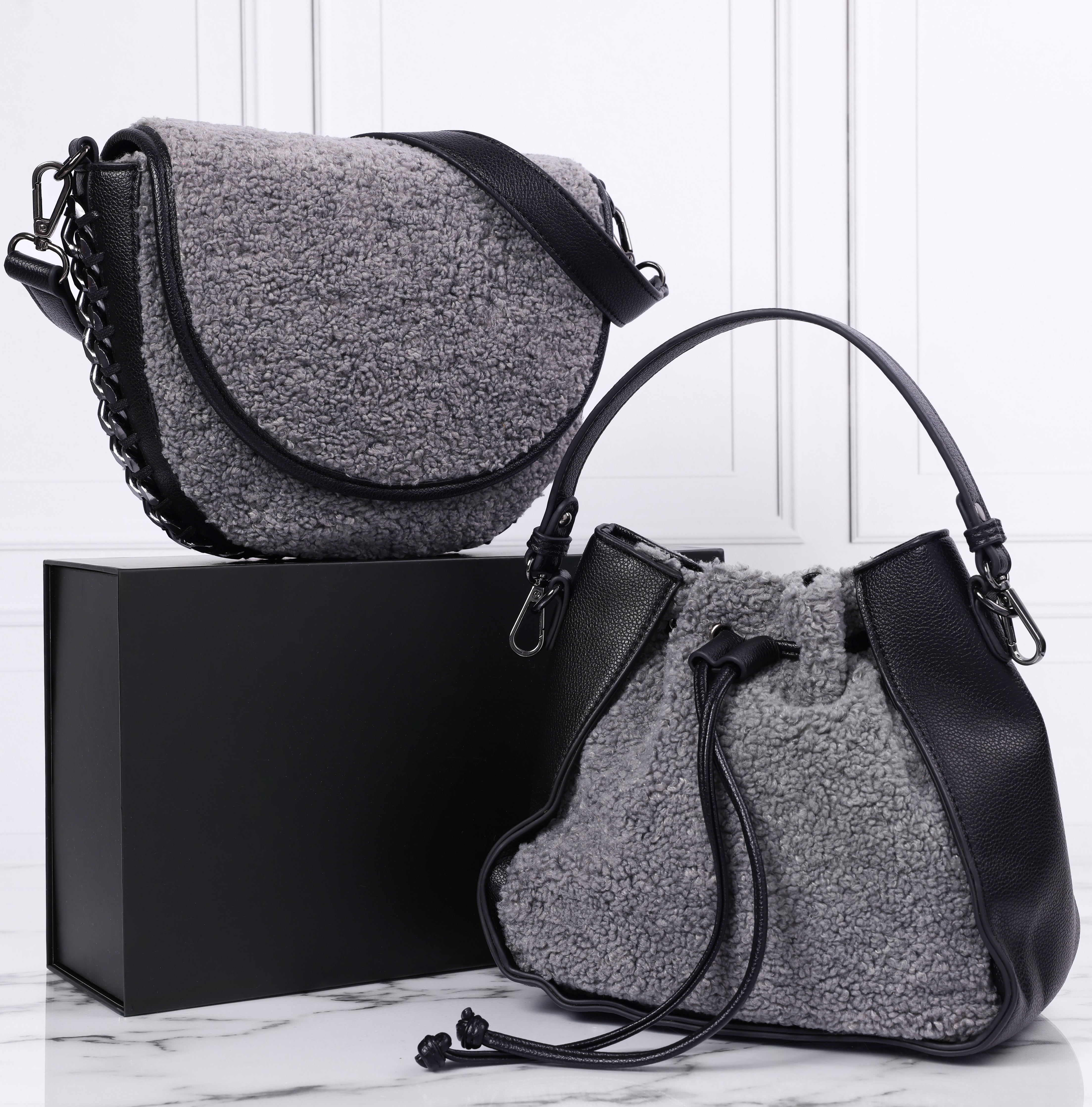 Sondra shops Roberts black evening bag.